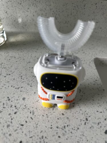 Sensory 360 Round U-Shaped Astronaut Design Mouthguard Electric Toothbrush for Kids Ages 2-7 - Automatic Memory Function - 5 Modes Toothbrush with Multiple Heads – Kids Travel Essentials (White) photo review