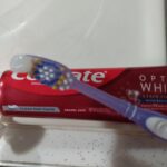 Colgate Optic White Stain Fighter Teeth Whitening Toothpaste. Anticavity Fluoride Toothpaste for Whitening Teeth. Helps Remove Daily Surface Stains. Clean Mint Paste. 4 Pack. 4.2 oz photo review