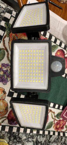 Tuffenough Solar Outdoor Lights 2500LM 210 LED Security Lights with Remote Control.3 Heads Motion Sensor Lights. IP65 Waterproof.270° Wide Angle Flood Wall Lights with 3 Modes(2 Packs) photo review